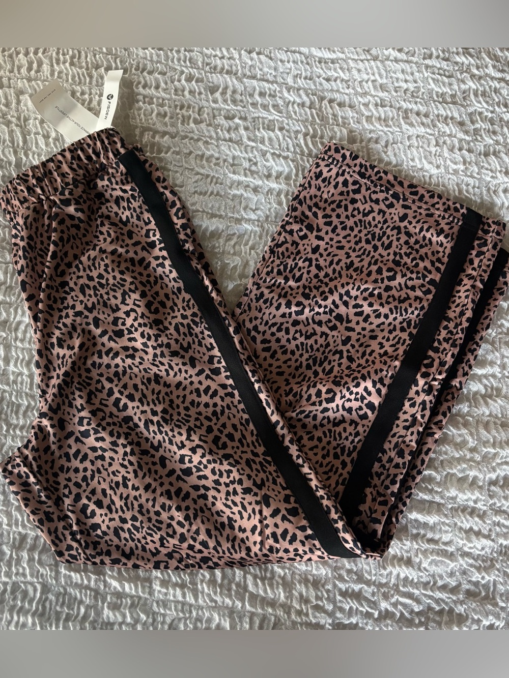 Leopard pants with racing stripe details size small NEW with tags
